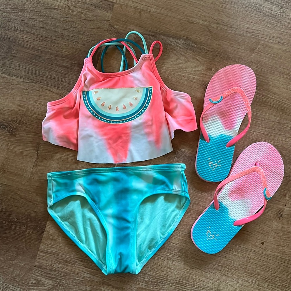 Watermelon color changing bathing suit and flip flops. Size 10.